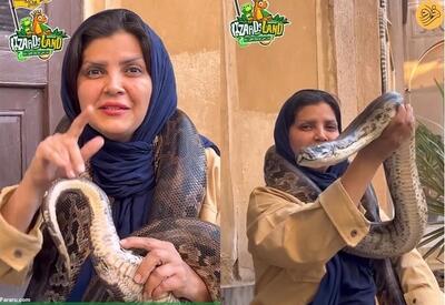 (ویدئو) این زن ایرانی زیر بغل مار پیتون را نشان داد!