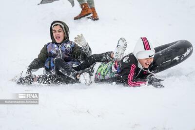 (تصاویر) تفریحات خانوادگی در ارتفاعات برفی تلو
