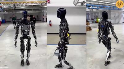 (ویدئو) قدم زدن ربات اپتیموس تسلا در محیط کارخانه