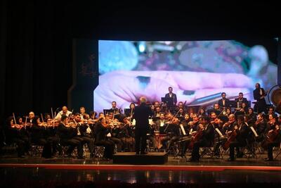 (ویدیو) اجرای ارکستر‌های ملی و سمفونیک در افتتاحیه جشنواره فیلم فجر