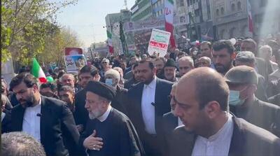 ویدئویی از رئیسی و خیل بادیگاردها در راهپیمایی ۲۲ بهمن | رویداد24