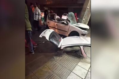 خودرو 206 له شده در اثر برخورد با تیر برق در بلوار ملاصدرا در کرج (فیلم)