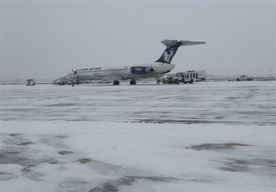 آخرین وضعیت فرودگاه مشهد پس از بارش برف/ برقراری پروازهای داخلی و خارجی + فیلم - تسنیم