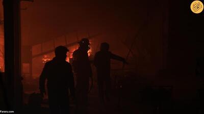 (تصاویر) آتش‌سوزی گسترده در بازار اربیل عراق
