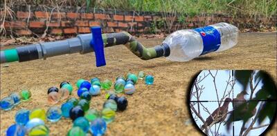 چگونه یک تفنگ بادی قدرتمند با بطری و لوله پلاستیکی برای عید بسازیم (فیلم)