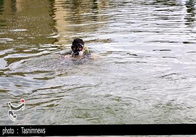 نجات کودک غرق شده در کارون توسط شهروندان اهوازی - تسنیم