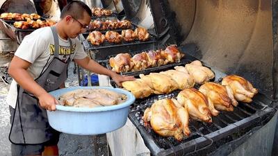نحوه پخت چلو مرغ محلی در دیگ سفالی (فیلم)