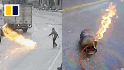 (ویدئو) پلیس شجاع سیلندر گاز آتش گرفته را خاموش کرد