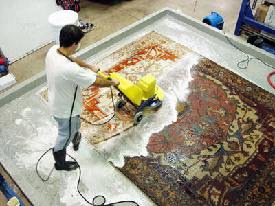 کلاهبرداری با پوشش قالیشویی