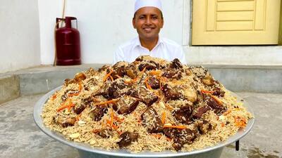 (ویدئو) نحوه پخت 30 کیلو کابلی پلو با گوشت به سبک یک آشپز مشهور روستایی پاکستانی