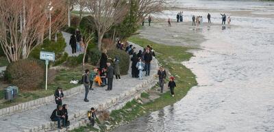 تصاویر| جاری شدن آب در زاینده‌رود؛ اصفهان