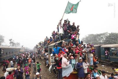 فیلم/ عبور دو قطار غیرعادی از روی هم در بنگلادش!