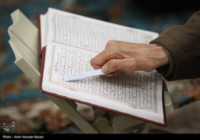 تعویض قرآن‌های فرسوده ‌در نمایشگاه قرآن و عترت خوزستان - تسنیم