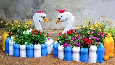 با بطری های پلاستیکی و بتن برای باغ خو گلدان گل به شکل قو درست کنید !