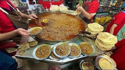 غذای خیابانی مشهور در پاکستان؛ فرآیند پخت 200 کیلو واویشکای جگر بره و گاو