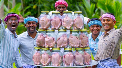 (ویدئو) غذای روستایی مشهور در هند؛ نحوه پخت مرغ کامل در ظرف شیشه ای