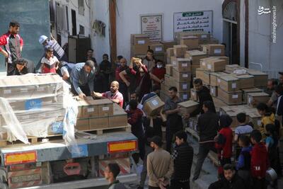 عکس/ تحویل کمک‌های غذایی به آوارگان در غزه