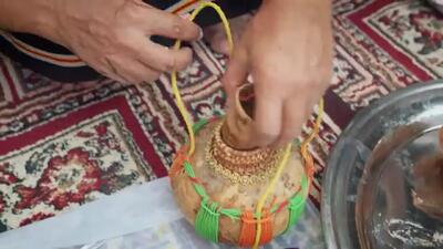 (ویدئو) نحوه پخت بز کامل با برنج به شکل سنتی در روستای جزان عربستان