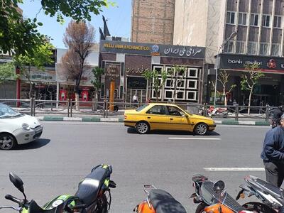 تصاویر | خلوتی جالب صرافی‌ها در تهران - عصر خبر