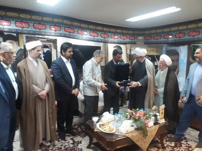 وزیر خارجه با اهدای گل از خانواده شهید طهرانی‌مقدم قدردانی کرد