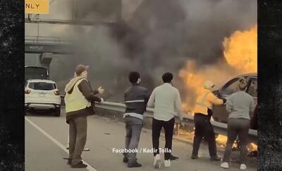 (ویدئو) نجات دراماتیک راننده خودرو از میان شعله‌های آتش