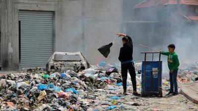 فاجعه زیست‌محیطی در غزه؛ موج گرما موجب وخیم‌تر شدن خطرات انباشت زباله‌‌ها می‌شود | خبرگزاری بین المللی شفقنا