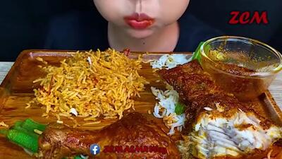 (ویدئو) غذا خوردن به سبک دختر مشهور تایلندی؛ خوردن 1.3 کیلو چلو ماهی و مرغ