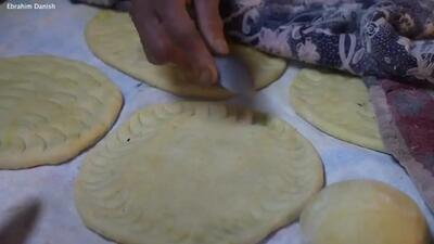 نان محلی افغانی با طعم اصیل: تماشای پخت نان در تنور به روش سنتی!