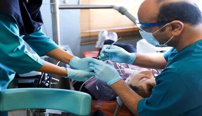 این دانش آموزان خدمات دندانپزشکی رایگان می‌گیرند