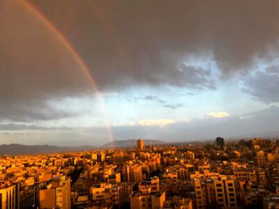 تصویری دیدنی از رنگین‌ کمان زیبا در آسمان تهران