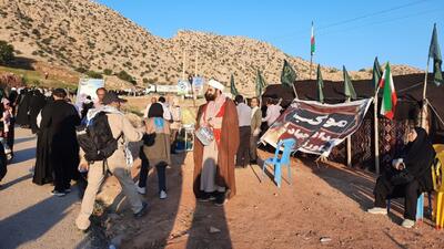 خدمت‌رسانی بسیجیان به زائران قدمگاه شهیدان در ارتفاعات بازی‌دراز