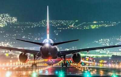 فرود زیبای یک هواپیمای مسافربری در فرودگاه مدرن کیش+ فیلم