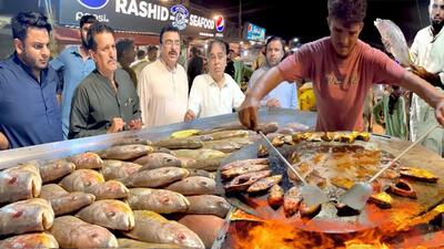 (ویدئو) غذای خیابانی در پاکستان؛ ماهی سرخ شده و کبابی به سبک بنگلادشی در کراچی