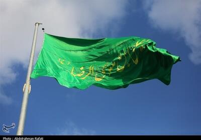 اهتزاز پرچم مزین به نام حضرت رضا (ع) در همدان- فیلم دفاتر استانی تسنیم | Tasnim