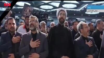 عزاداری و گریه دولتمردان در لحظات ورود پیکر شهدا به مصلای تهران + ویدئو