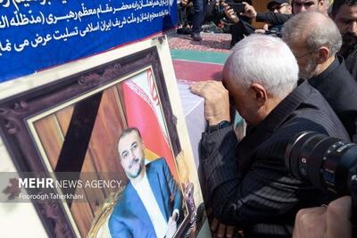 عکس/گریه ظریف در کنار تابوت امیرعبداللهیان | اقتصاد24