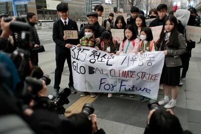 یک کودک 18 ماهه در میان «شاکیان اقلیمیِ دولت کره جنوبی» | خبرگزاری بین المللی شفقنا