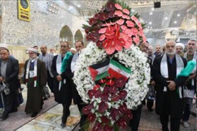 ادای احترام مسوولان دفاتر حماس و جهاد اسلامی به شهید خدمت