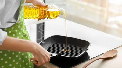ترفندهای کاربردی برای جلوگیری از پاشیدن روغن موقع آشپزی