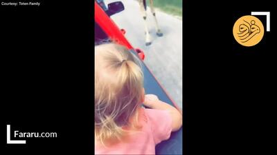 (ویدئو) لحظه دلهره‌آور بلند کردن یک دختربچه توسط زرافه