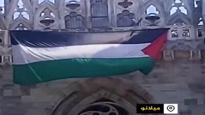 پرچم فلسطین بر دیوار کلیسای جامع میلان + فیلم