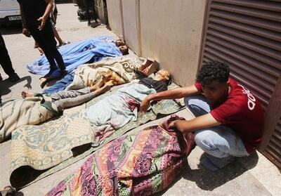 244 شهید در 75 دقیقه؛سرهای بریده شهدای فلسطینی در النصیرات - تسنیم