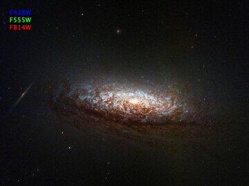 تصویر روز ناسا: کهکشان غبارآلود از نگاه تلسکوپ فضایی هابل