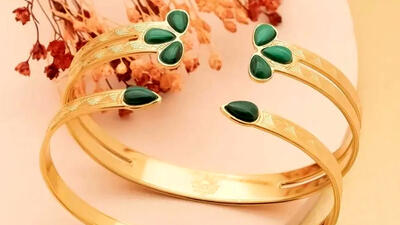 انواع مدل های دستبند طلا با سنگ سبز / عکس
