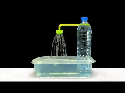 (ویدئو) فرآیند درست کردن یک آبنمای رومیزی با بطری پلاستیکی