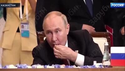 شیوه عجیب آجیل‌ خوردن پوتین وسط اجلاس رسمی که سوژه رسانه ها شد