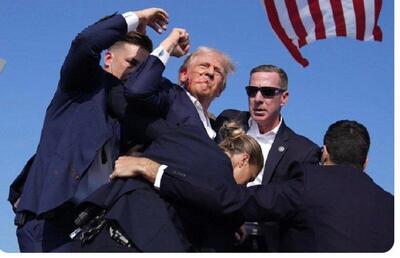طرفداران ترامپ: عیسی مسیح از او محافظت می کند/ عکس