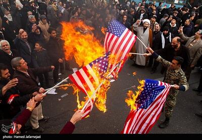 کرمانشاهیان پرچم یزیدیان زمان را به آتش می‌کشند - تسنیم