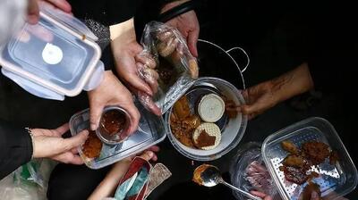 حضور بانوان در مراسم سنتی پخت حلوا در تاسوعای حسینی+ فیلم